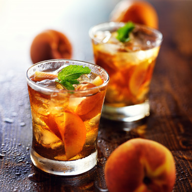 two glasses of sweet peach iced tea