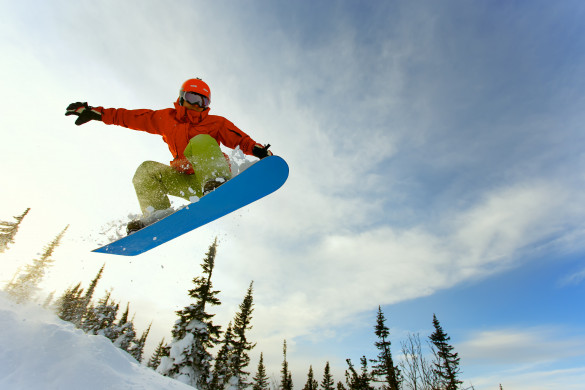 Snowboarder jumping