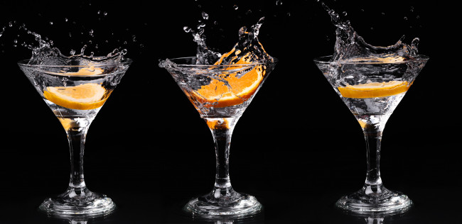 Vermouth cocktail inside martini glass over dark background