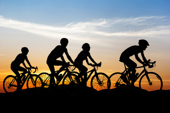 People cycling at hill mountain