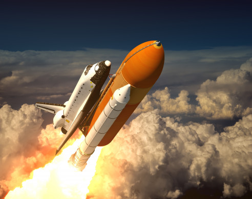 Space Shuttle In The Clouds