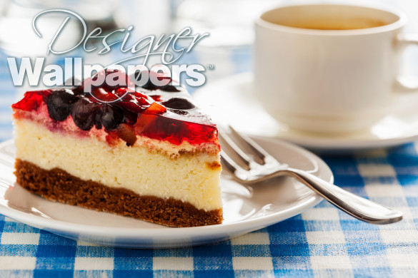 Cake on plate with fork and coffee cup