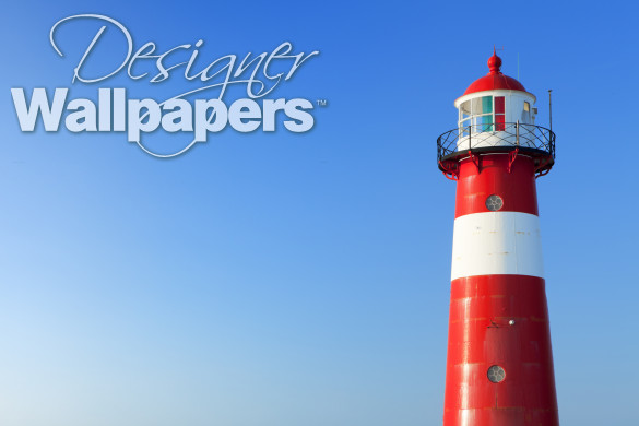 Red and white lighthouse and a clear blue sky