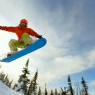 Snowboarder jumping