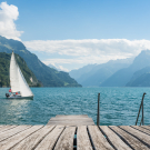 Mountain range in the clouds, view of the lake