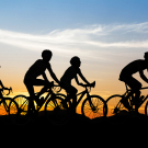 People cycling at hill mountain