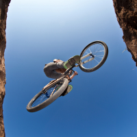 Boy going airborne with a dirt bike