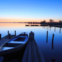 Tranquil, spring dawn in a small marina at a lake.