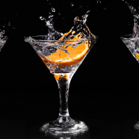 Vermouth cocktail inside martini glass over dark background