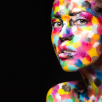 Girl with colored face painted
