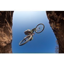 Boy going airborne with a dirt bike