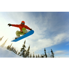 Snowboarder jumping