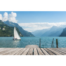 Mountain range in the clouds, view of the lake