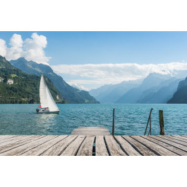 Mountain range in the clouds, view of the lake