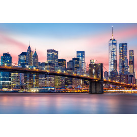 Manhattan skyline under a purple sunset